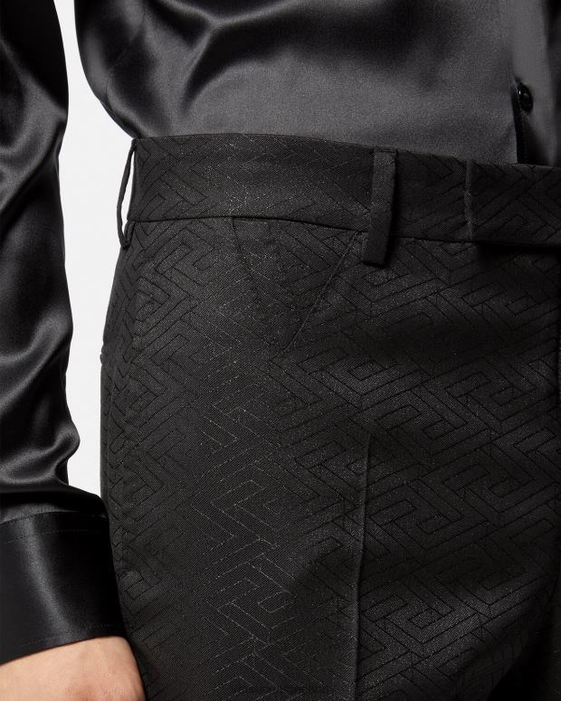 hombres Versace negro pantalones con greca jacquard ropa 4F6041276