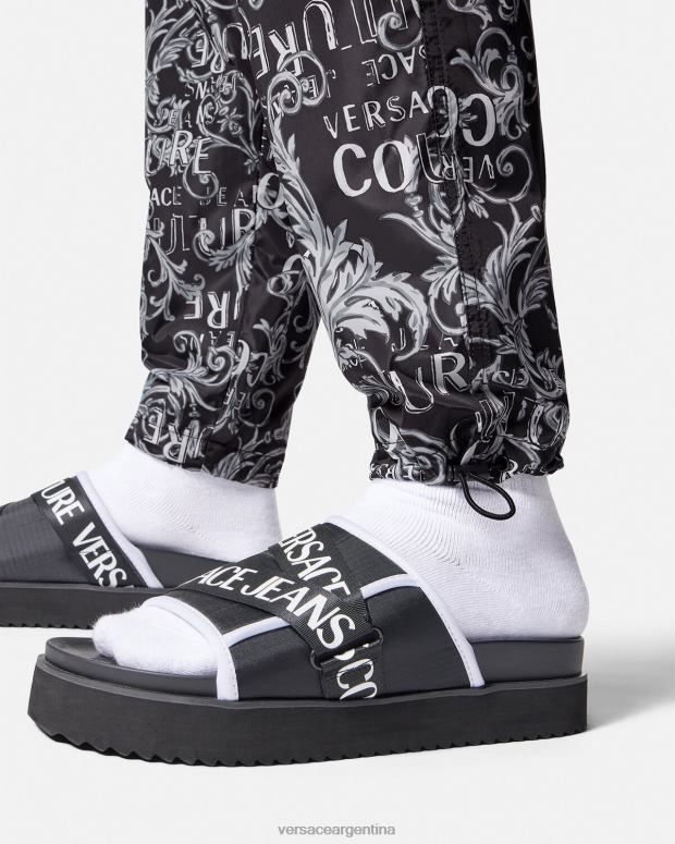 hombres Versace negro y estampado pantalones de alta costura con logo ropa 4F6042431